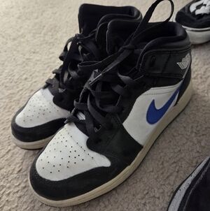 Nike Air Jordan High-Top Sneakers in Black, White, and Blue